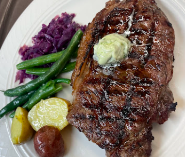 Le Sans Souci French Restaurant signature dishes Lobster Thermidor
Baked Lobster Tail with Drawn Butter
Filet Mignon